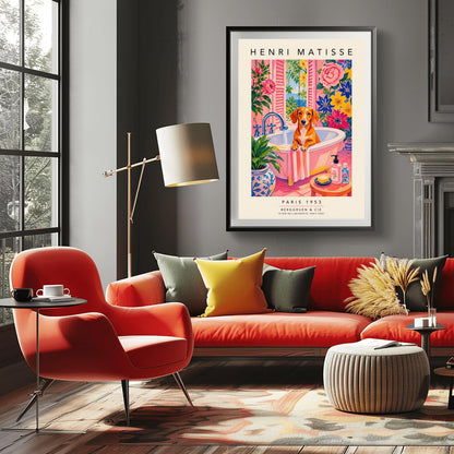 A vertical maximalist art print styled as a Henri Matisse exhibition poster. A brown Dachshund dog sits in a pink bathtub while water pours from a silver faucet. The room features vibrant pink walls and floors, decorated with very large pink, blue, and yellow flowers. A blue and white floral pot sits in the foreground along with a small stool holding soap and bottles. An open window in the background shows a blue sea and green leaves.