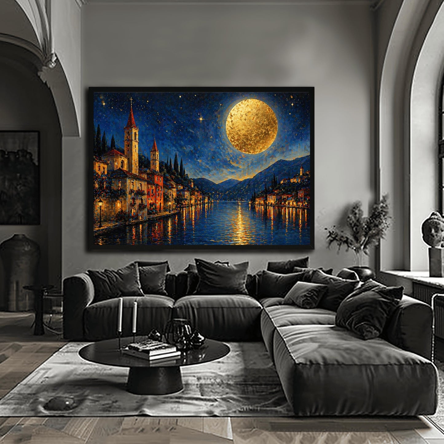 A horizontal art print in a decorative mosaic style inspired by Gustav Klimt. A charming lakeside village with warm-lit windows and tall church spires sits along the edge of dark blue water. A massive, glowing golden moon with heavy texture hangs in a starry night sky. The light from the moon and the town reflects in long, shimmering streaks on the water. The mountains in the distance are shaded in soft blues and purples.