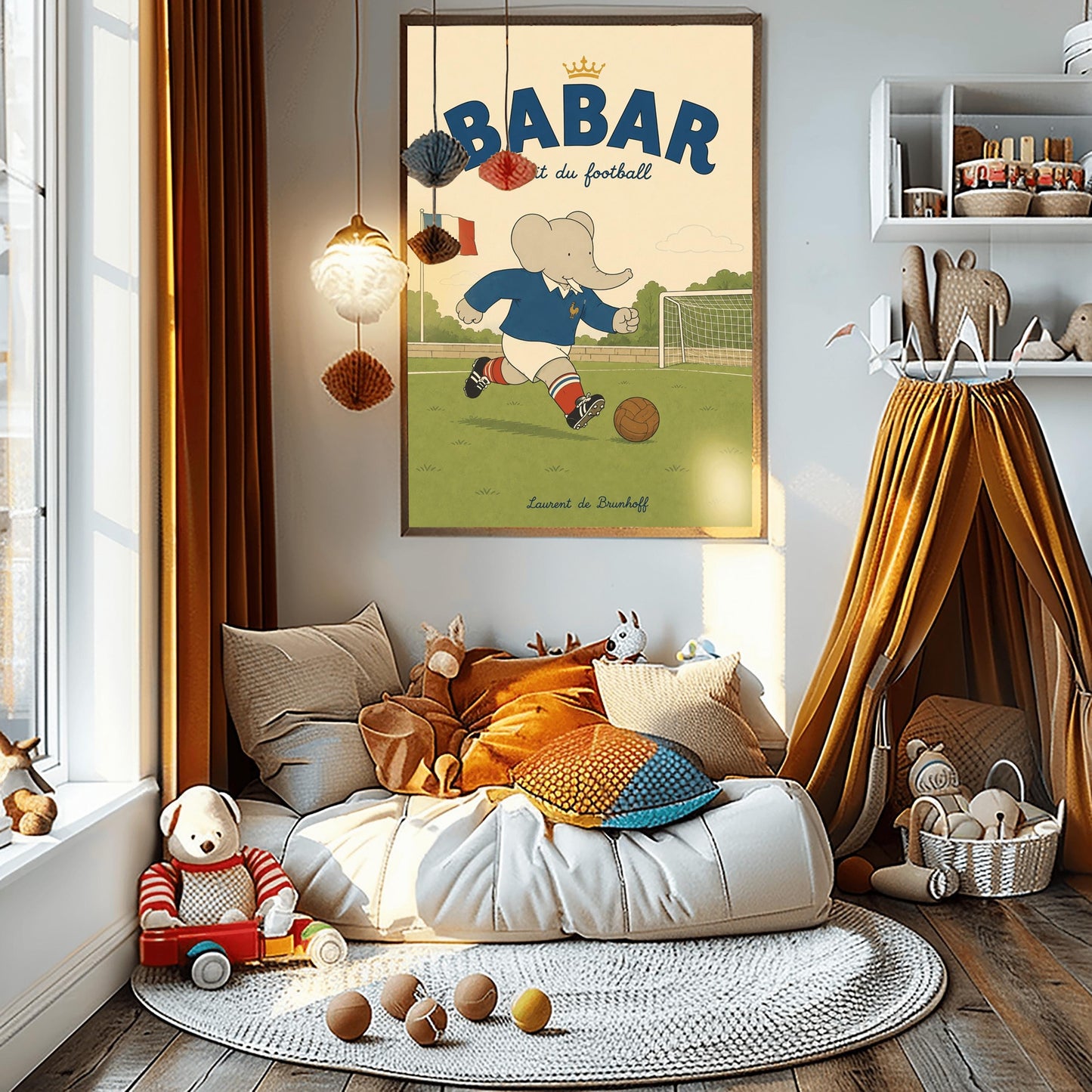 A vertical storybook-style art print featuring Babar the Elephant playing soccer on a green field. Babar wears a blue jersey with a small gold rooster logo, white shorts, red striped socks, and black cleats. He is dribbling a brown leather soccer ball toward a white goal. A French flag flies in the background. The text at the top says "BABAR fait du football" with a small gold crown.