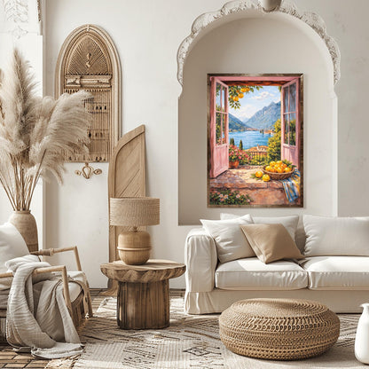 A vertical painterly illustration looking through open pink French doors onto a large blue lake surrounded by tall mountains. A woven basket of lemons sits on a stone ledge in the foreground next to a striped cloth and a pot of pink flowers.