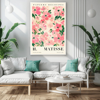 A vertical art print styled as a Henri Matisse exhibition poster. The central image is a dense pattern of soft pink and rose-colored flowers with dark green leaves on a cream-colored background. The flowers are painted with visible, textured brushstrokes. Above the image, the words "PAPIERS DÉCOUPÉS" are written in a black serif font. Below the image, the text reads "H. MATISSE" in large letters, with "ECOLE DE PARIS" and "FRANCE 1890" in smaller text at the bottom.