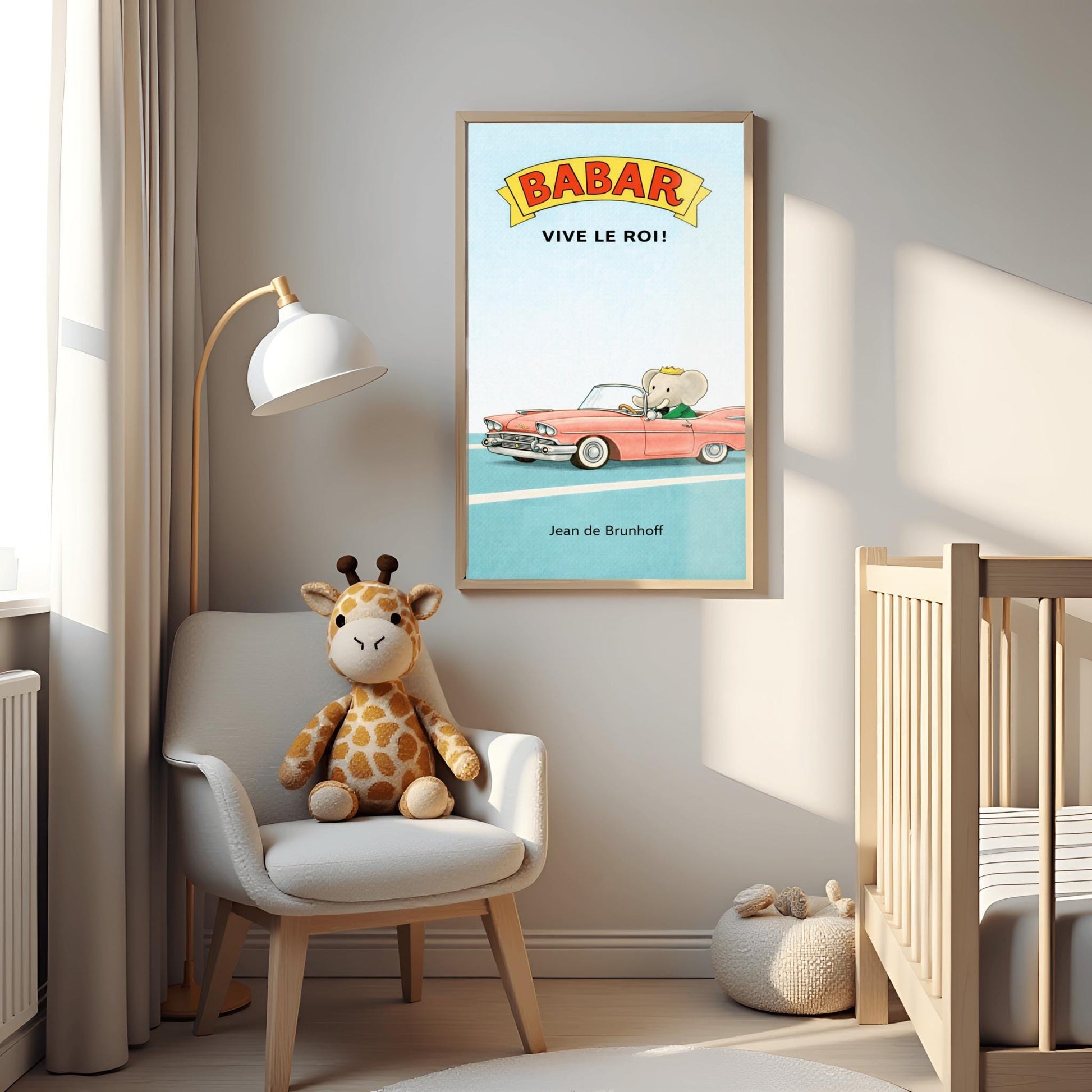 A vertical children's illustration poster. At the top, a yellow banner reads "BABAR" in red letters, with "VIVE LE ROI!" written in black below it. At the bottom, King Babar in a green suit and crown is driving a large, salmon-pink vintage convertible car with white tires. The car is on a simple blue road with white lines, and the background is a solid light blue sky. The name "Jean de Brunhoff" is at the bottom.