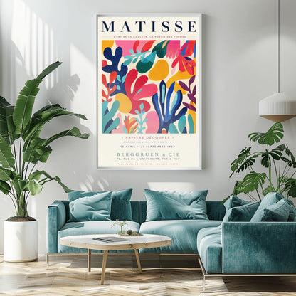 A vertical gallery exhibition poster with a warm cream border. Bold black text at the top reads "HENRI MATISSE". The central artwork is a rectangular block with a solid cobalt blue background, featuring a cream silhouette of an abstract, organic split-leaf design. Below the block, black text reads "PAPIERS DÉCOUPÉS" and "FEUILLE". The bottom of the poster finishes with the text "BERGGRUEN & CIE - 70 RUE DE L'UNIVERSITÉ - PARIS VII".