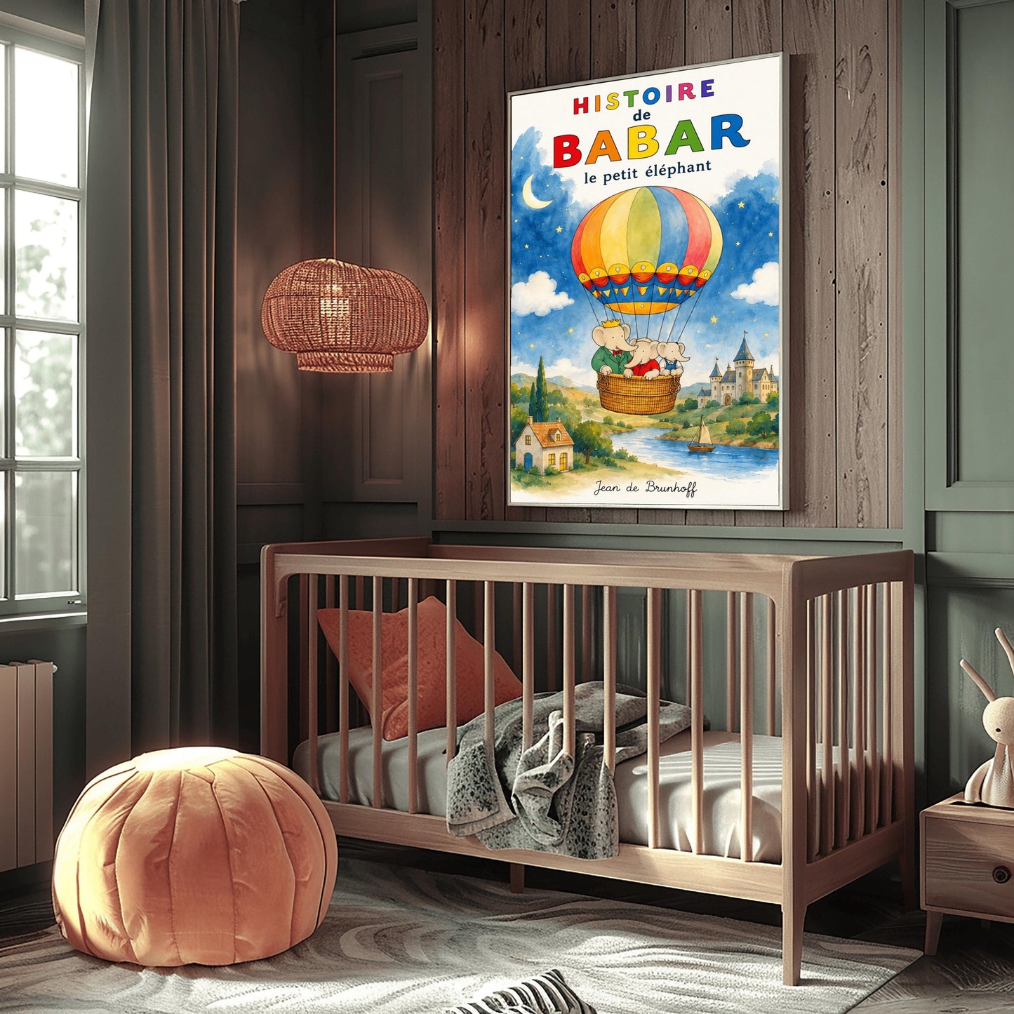 A vertical retro fine art exhibition poster titled "HISTOIRE de BABAR le petit éléphant" with a wide cream border. The illustration features a colorful hot air balloon carrying three elephants—one with a crown—floating in a sky that is half daytime blue and half starry dark blue with a crescent moon. Below them is a watercolor landscape of a river with a sailboat, a cottage, and a turleted castle. The signature "Jean de Brunhoff" anchors the bottom.