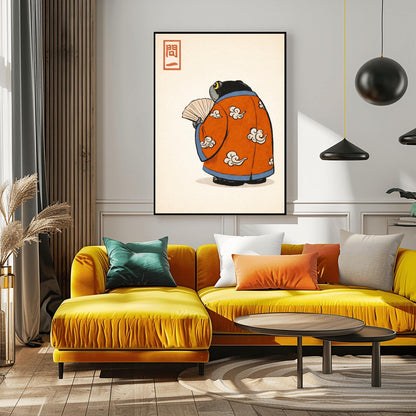 A vertical Japanese woodblock-style art print of a large, dark grey-black frog seen from behind. The frog is wearing an ornate burnt orange kimono decorated with white cloud motifs and blue piping. It holds a beige folding fan in its small hand. In the top left corner is a red rectangular stamp containing Japanese calligraphy. The entire image is set against a textured, pale cream background in a minimalist aesthetic.