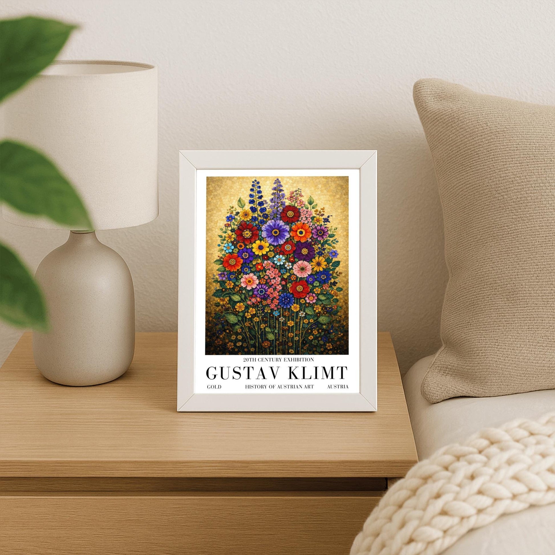 A vertical art print in the style of Gustav Klimt featuring a dense bouquet of colorful wildflowers. The flowers, including red, purple, and orange zinnias and tall blue delphiniums, are rendered as intricate mosaics with geometric patterns. The entire arrangement is set against a shimmering, gold-tiled background that glows with metallic light. The style is highly decorative, maximalist, and vibrant.
