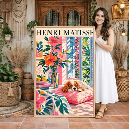 A vertical minimalist fine art exhibition poster in the style of Henri Matisse, featuring a large white border layout. In the center, a simple black line drawing outlines the head and long floppy ears of a Cavalier King Charles Spaniel dog. The illustration is accented by vibrant abstract cut-out shapes, including a solid blue organic leaf on the left, a large terracotta red shape on the right, and a bright yellow gold block at the base against a clean white background.