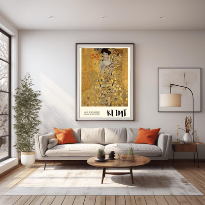 A vertical museum exhibition poster of Gustav Klimt's 1907 "Portrait of Adele Bloch-Bauer I." A woman is shown encased in a lavish gold dress with eye and triangle patterns against a shimmering gold mosaic background. The bottom border is cream with bold black text reading "ADELE BLOCH-BAUER I" and "KLIMT."