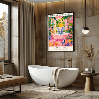 A vertical maximalist art print styled as a Henri Matisse exhibition poster. A light grey baby elephant is sitting in a large pink clawfoot bathtub filled with white bubbles. The bathroom features hot pink tiled floors, vibrant pink flowers, and lush green tropical plants. In the background, an arched window shows a bright golden sunset with palm tree silhouettes. A small yellow stool with towels and various blue and yellow ceramic vases decorate the room.