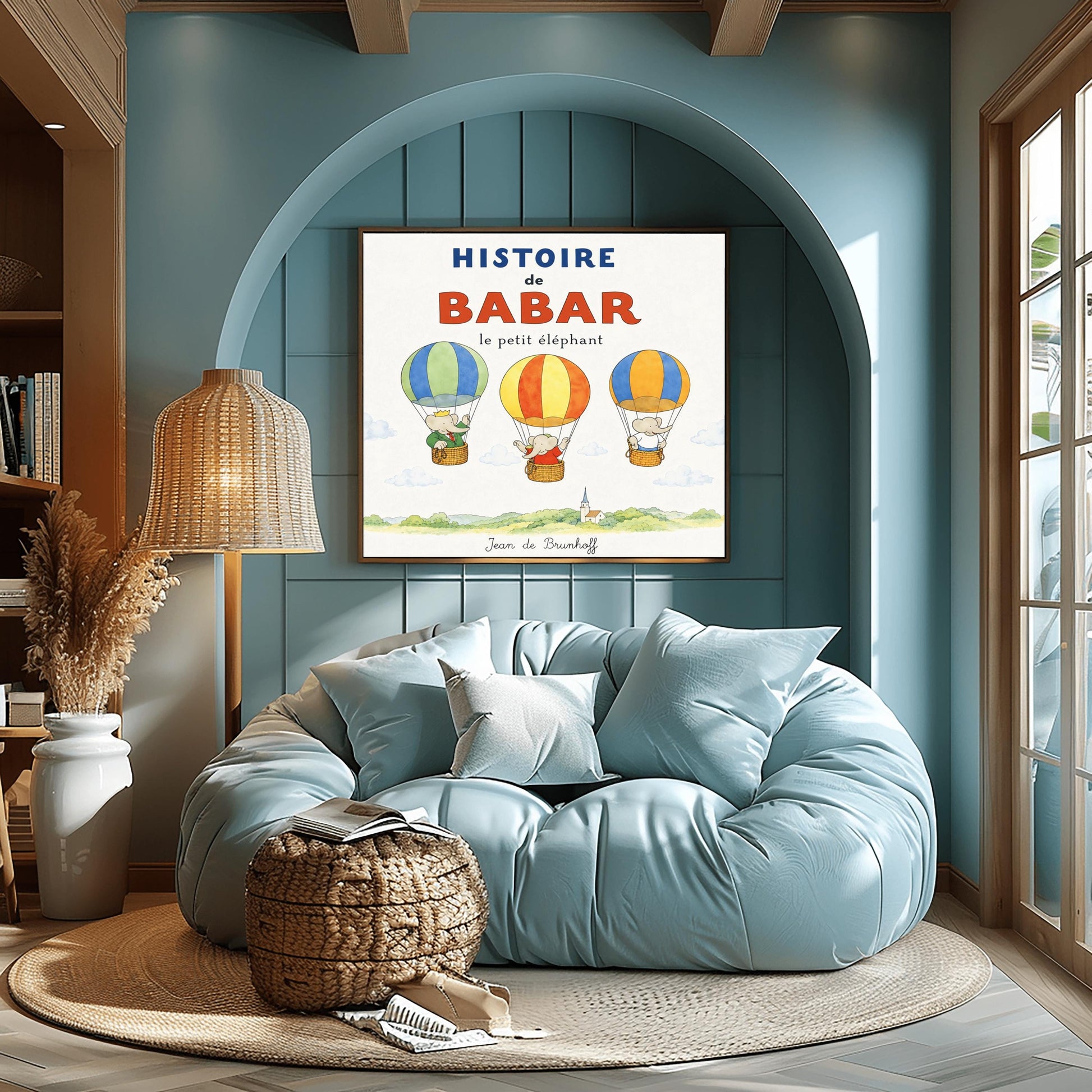 A whimsical vintage-style storybook poster on a clean white background titled "HISTOIRE de BABAR le petit éléphant" in bold blue and orange lettering. The illustration features three cartoon elephants floating in striped hot air balloons over a light green watercolor countryside with a white church steeple. On the left, King Babar in a green suit and crown waves from a blue-and-green balloon. In the center, an elephant in a red dress sits in a yellow-and-orange balloon.