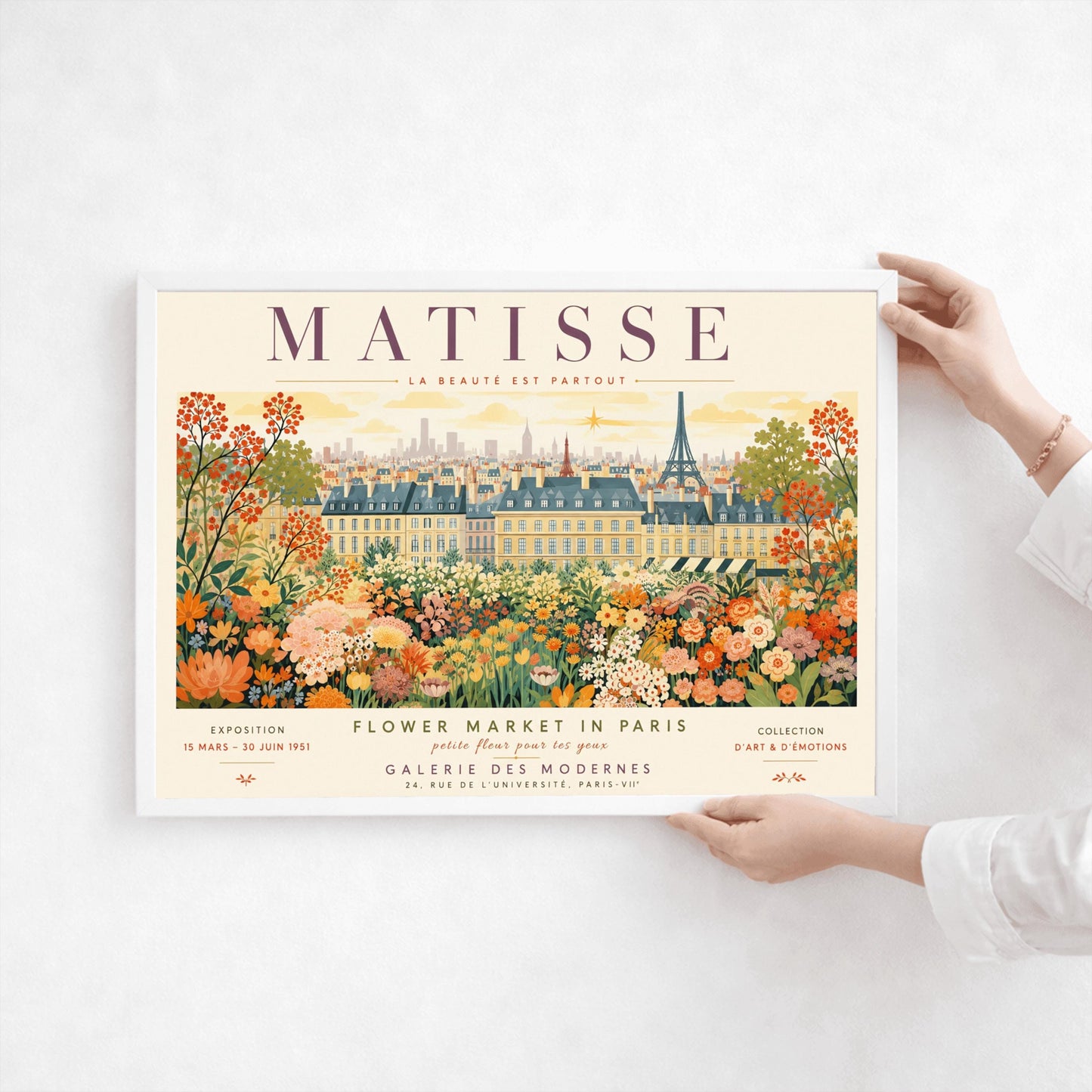 A French art exhibition poster titled "MATISSE" across the top. The central illustration shows a sprawling field of dense, colorful wildflowers in shades of orange, yellow, and white. In the background, classic Parisian buildings and the silhouette of the Eiffel Tower stand under a soft yellow sky. The text at the bottom reads "Flower Market in Paris, Galerie des Modernes, 24, Rue de l'Université, Paris."