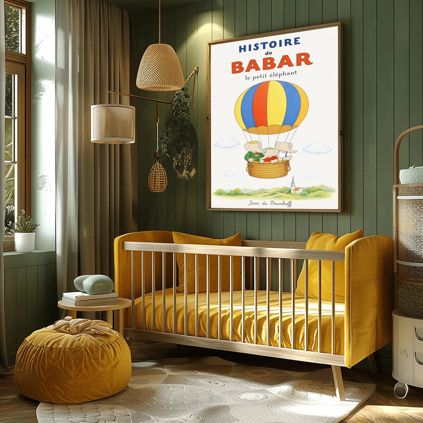 A vertical vintage-style storybook poster on an off-white background titled "HISTOIRE de BABAR le petit éléphant" in bold blue and orange font. The illustration features a large hot air balloon with yellow, blue, and orange stripes floating in a sky with soft clouds. Inside the wicker basket, three cartoon elephants ride together. On the left, King Babar wears a green suit and crown while pointing ahead. The other two young elephants wear red and white shirts.