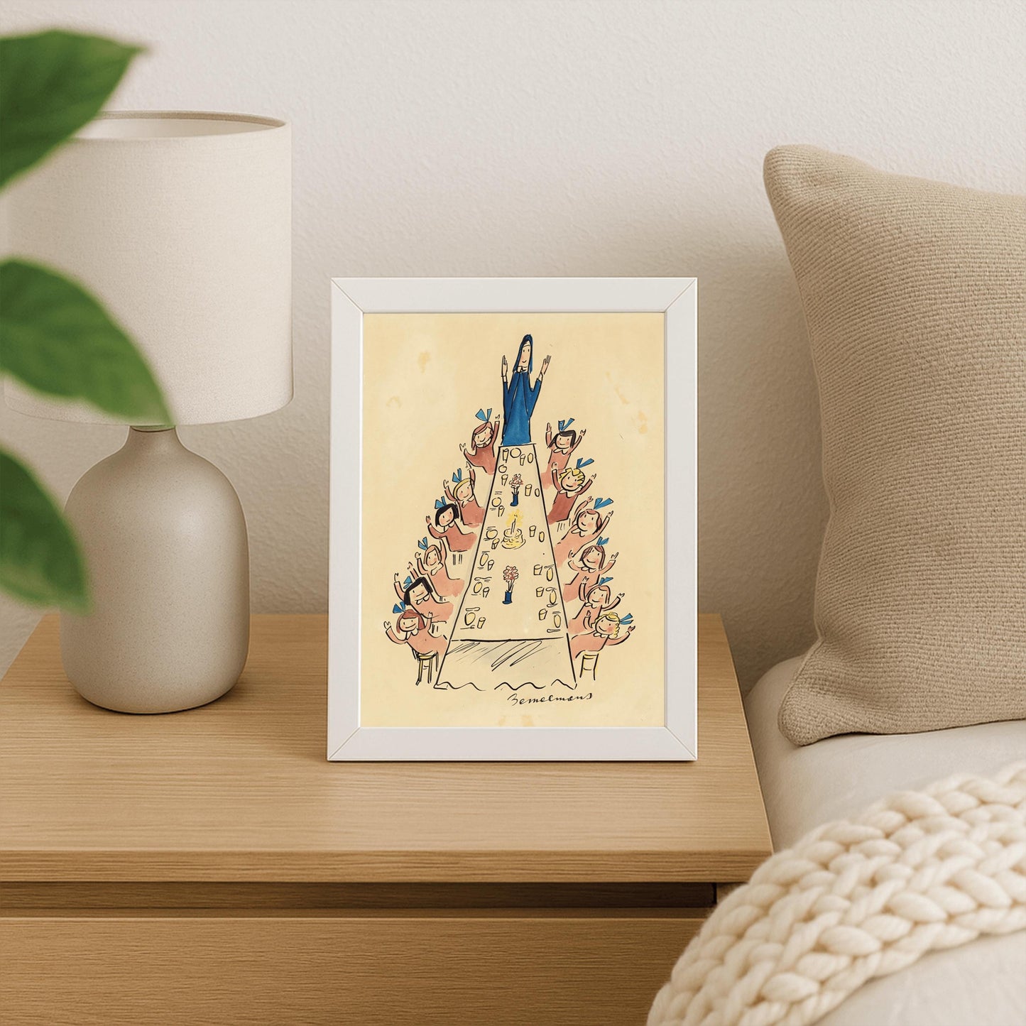 A vertical ink and watercolor illustration by Ludwig Bemelmans showing a festive gathering. A long dining table stretches from the foreground to the back of the room, topped with a birthday cake with one lit candle and small flower arrangements. Miss Clavel, dressed in a blue habit, stands with her arms raised at the head of the table. Along both sides of the table, little girls in pink dresses and blue hair bows wave their hands joyfully. Signed "Bemelmans" at the bottom center.