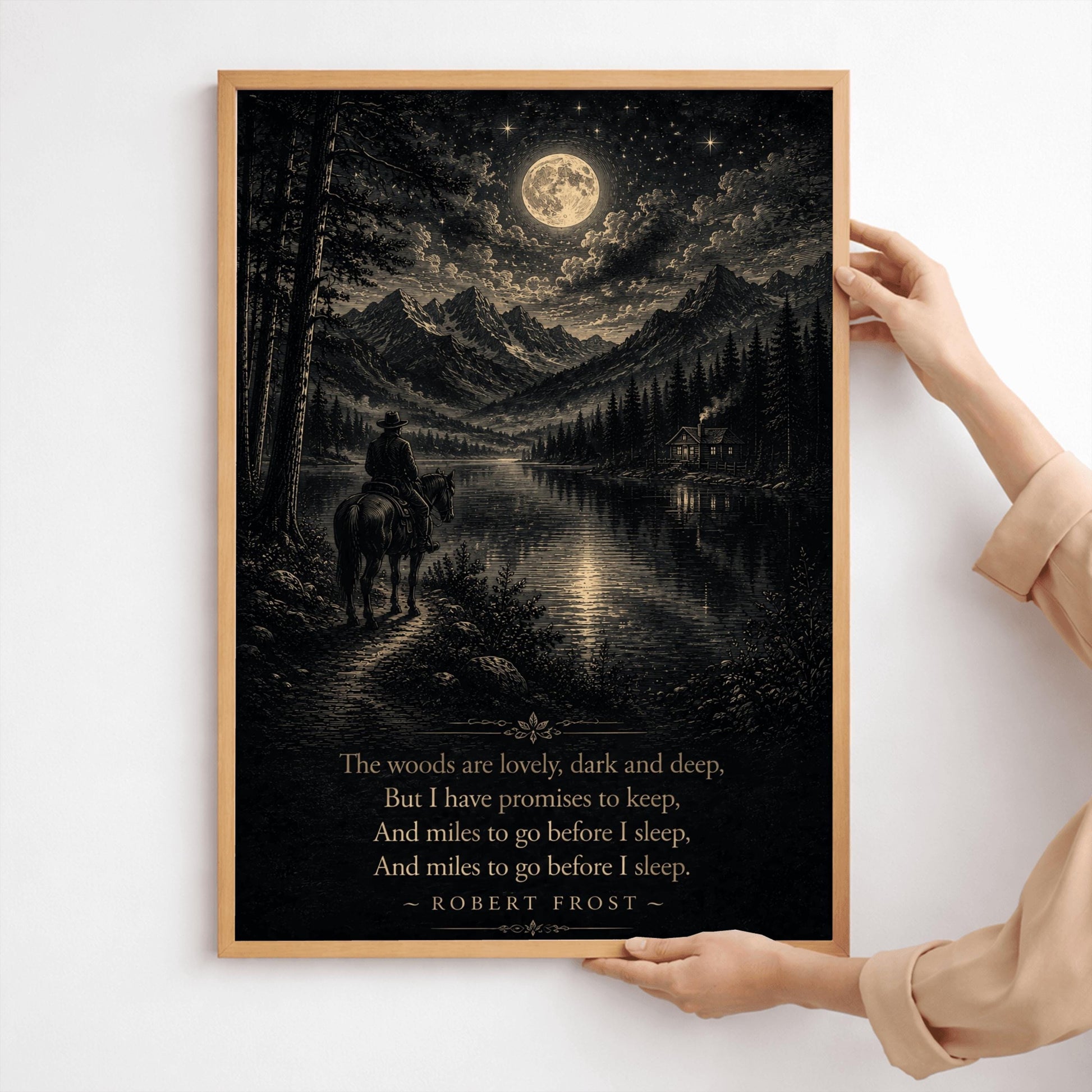 A detailed forest green and cream woodcut-style illustration of a rider on a horse looking across a lake toward a small cabin and distant mountains under a starry sky. The bottom of the image features the final four lines of Robert Frost's poem "Stopping by Woods on a Snowy Evening".
