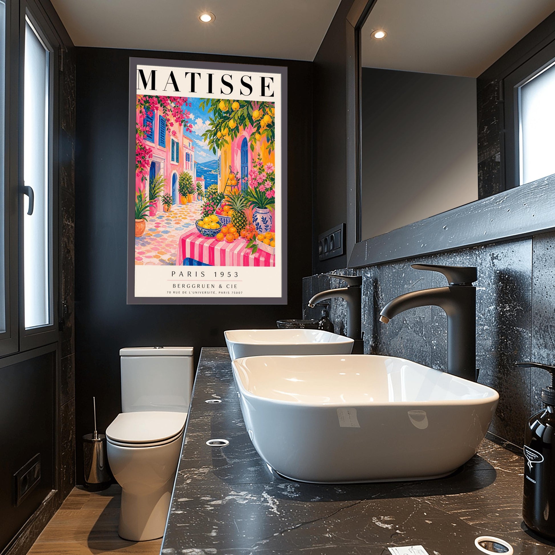 A vertical maximalist art print styled as a Henri Matisse exhibition poster. The scene depicts a vibrant, colorful street in a Mediterranean coastal town. In the foreground, a table with a pink and white striped cloth is piled high with lemons, oranges, and a pineapple. Hot pink and yellow buildings with blue shutters line a cobblestone path that leads toward a blue sea under a bright sky. Lush green trees with yellow lemons and pink flowers frame the view.