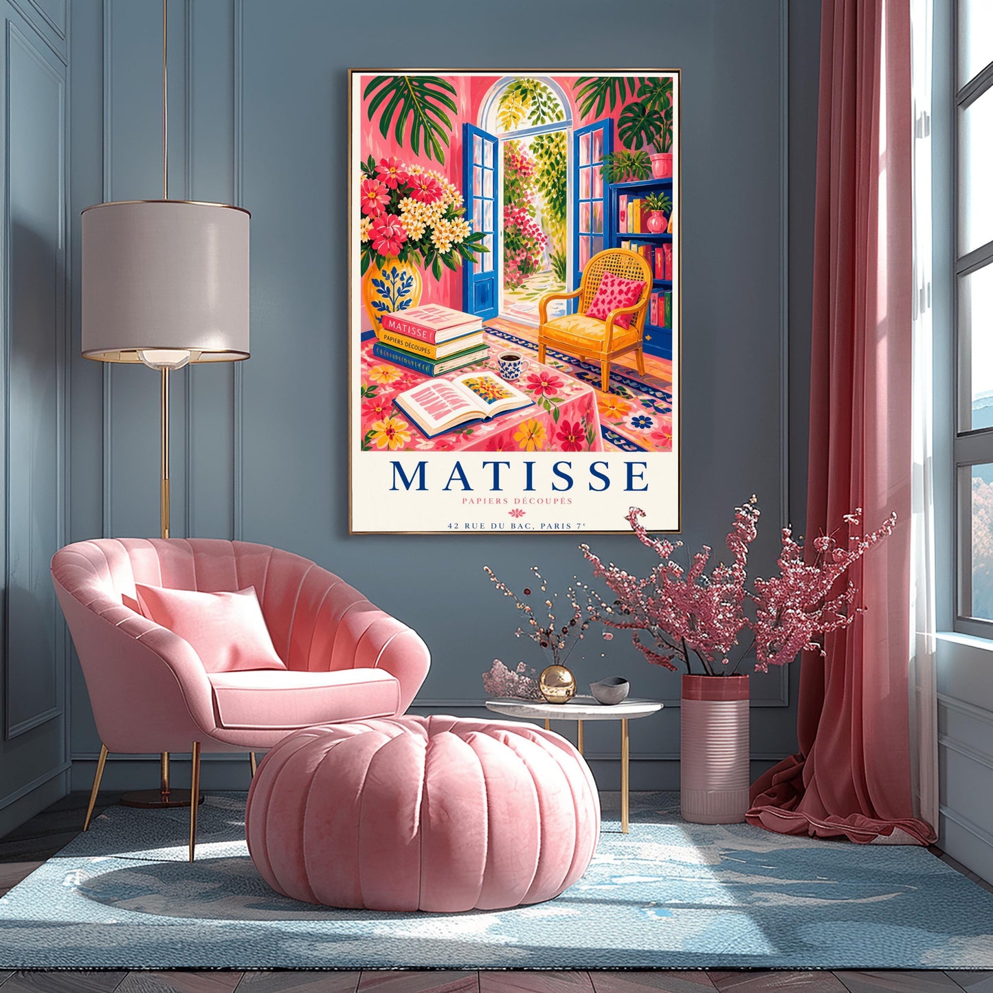 A vertical maximalist art print styled as a Henri Matisse exhibition poster. The scene shows a vibrant interior reading room with hot pink walls and cobalt blue French doors open to a sunlit garden. A yellow cane chair sits next to a bookshelf. In the foreground, a table covered in a pink floral cloth holds a stack of art books, an open book, and a blue coffee mug. Large monstera leaves and various flowers frame the room. Bold black and red text at the bottom reads "MATISSE PAPIERS DÉCOUPÉS"