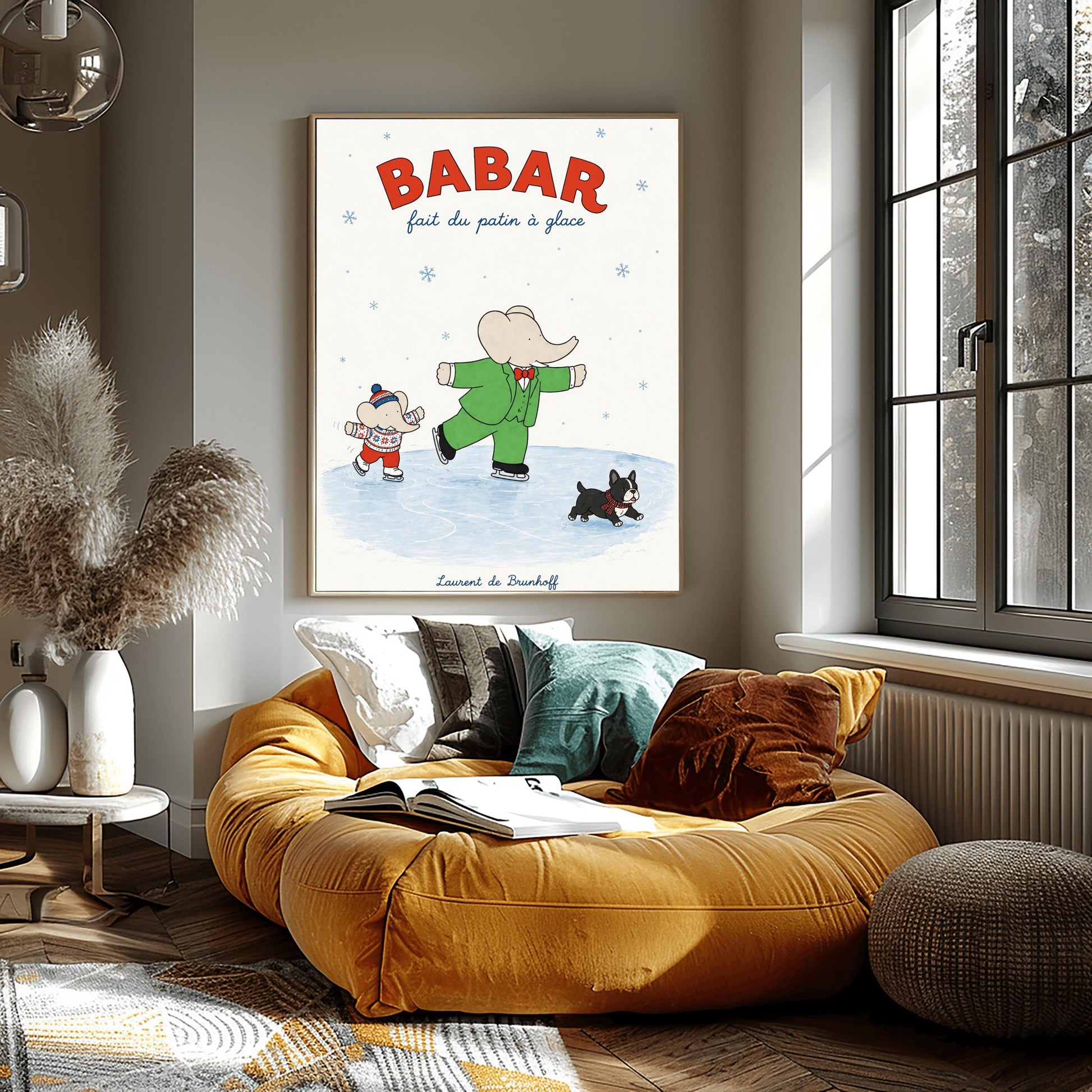 A vertical retro fine art exhibition poster titled "BABAR fait du patin à glace" on a wide cream border. The top "BABAR" text is printed in a bold red font. The illustration shows an elephant in a green suit and red bowtie ice skating on one leg next to a smaller elephant in a fair isle sweater and red pants. A small black dog in a plaid scarf slides on the ice below, and the name "Laurent de Brunhoff" anchors the bottom.