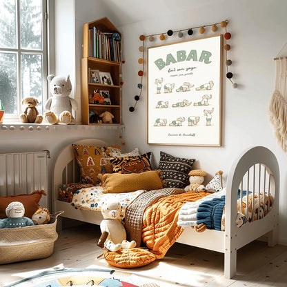 A vertical art print in muted sage green and cream tones titled "BABAR fait son yoga" with the subtitle "respire, joue, grandis." The poster shows eleven small, minimalist illustrations of a grey elephant in various yoga poses, wearing a white shirt and sage green shorts. The background is a soft off-white with a subtle paper texture, and the artist's name "Laurent de Brunhoff" is at the bottom.