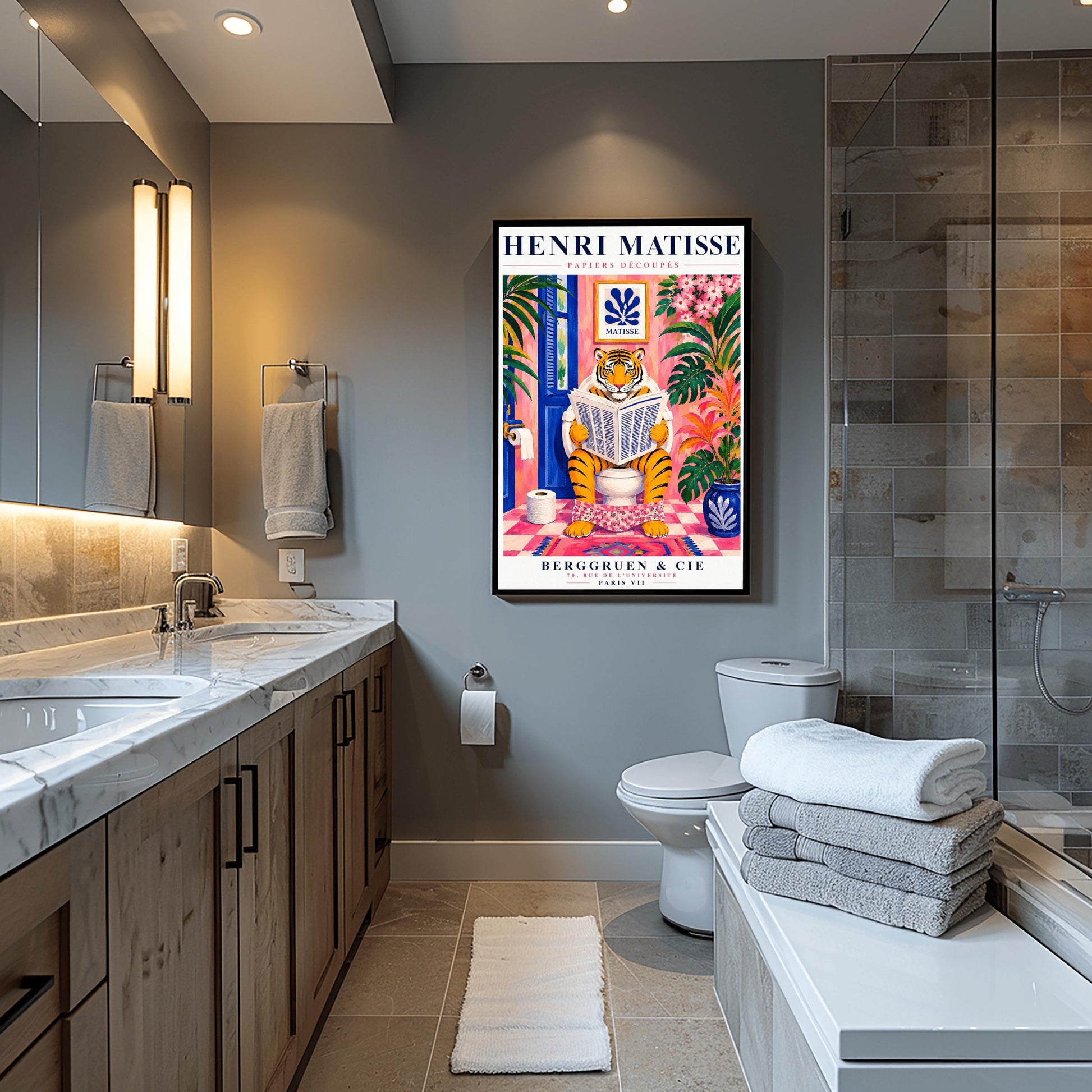 A vertical art print styled as a Henri Matisse exhibition poster. In the center, a tiger sits on a toilet in a pink bathroom, reading a newspaper with pink floral pants at its ankles. The room is decorated with lush tropical plants, a blue door, and a small Matisse-style blue cutout art piece on the wall. The text "HENRI MATISSE" is at the top, and "BERGGRUEN & CIE" is at the bottom.