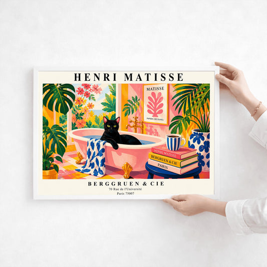 A horizontal art print designed as a Henri Matisse exhibition poster. A sleek black cat sits inside a pink clawfoot bathtub filled with water. The bathroom is vibrant with pink patterned walls, pink and yellow checkered tiles, and numerous large green Monstera plants. Outside the window is a bright garden with pink and orange flowers. A stack of art books and a striped mug sit on a blue stool in the foreground. The poster features bold black text at the top and bottom for "Henri Matisse"