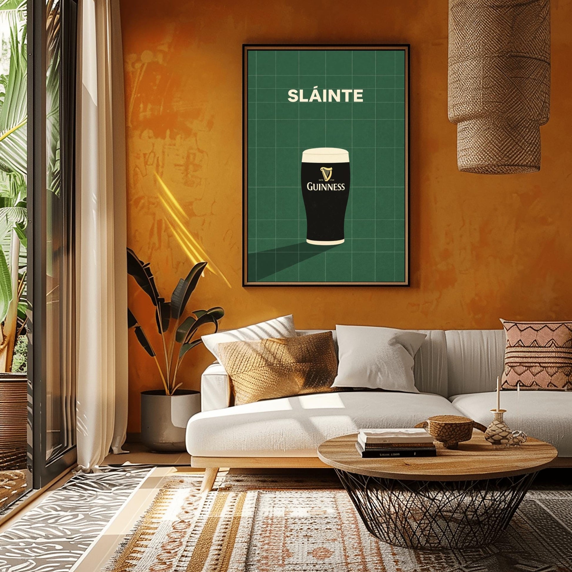 A vertical minimalist graphic with a dark green tiled background. A pint of Guinness with a gold harp logo sits at the bottom, casting a long shadow to the left. At the top, the word "SLÁINTE" is written in a bold, cream-colored font.