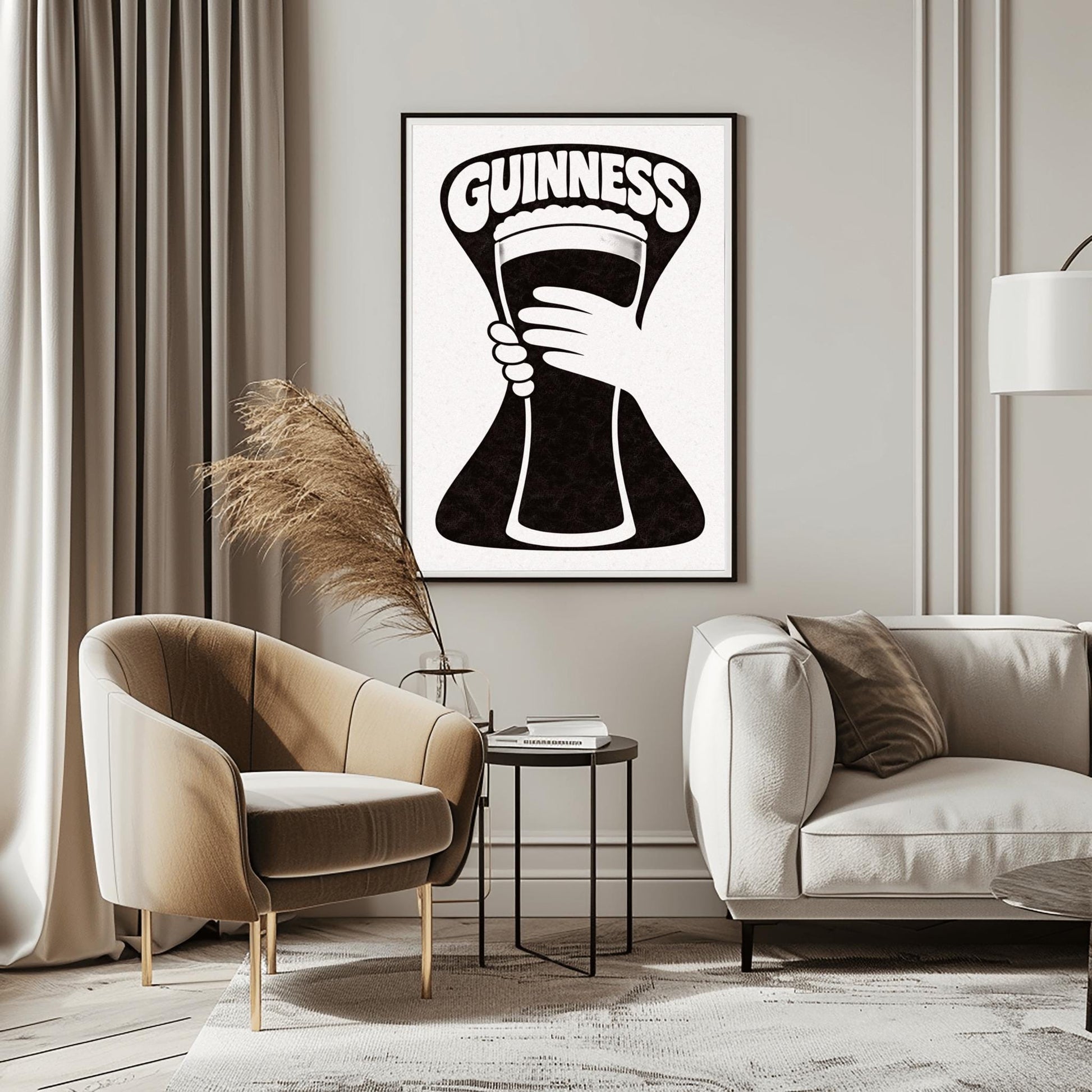 A vertical minimalist graphic in black and white. A large, black hourglass-shaped background features a white hand silhouette holding a pint glass made of negative space. The word "GUINNESS" is arched in bold white text at the top.
