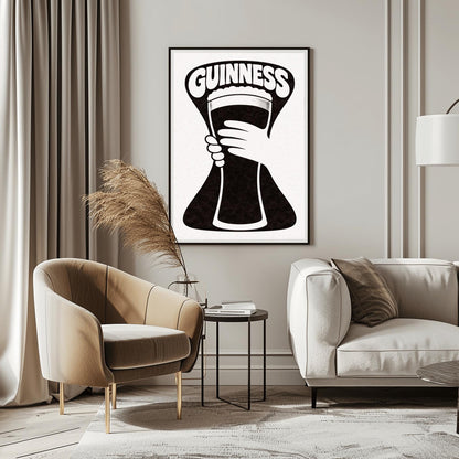 A vertical minimalist graphic in black and white. A large, black hourglass-shaped background features a white hand silhouette holding a pint glass made of negative space. The word "GUINNESS" is arched in bold white text at the top.