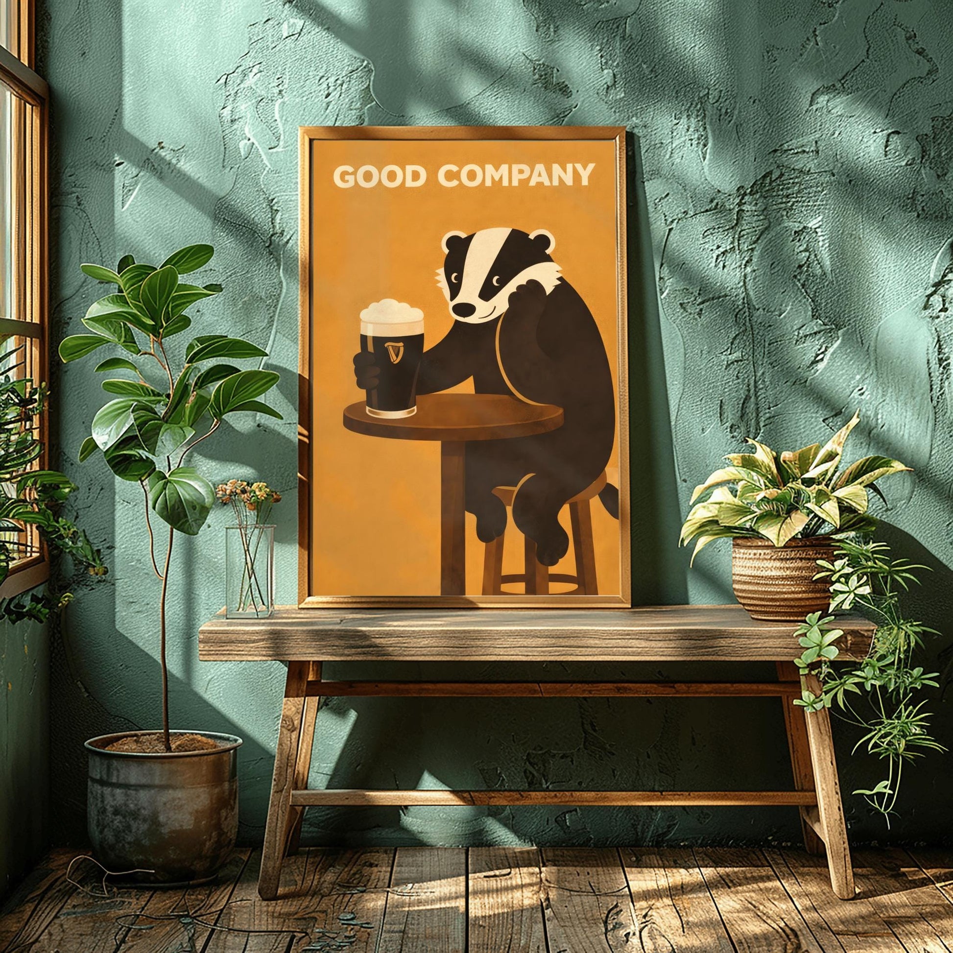 A vertical modern illustration of a cute black and white badger sitting at a round wooden bar table. The badger is leaning on one arm and holding a pint of Guinness with the other. The text "GOOD COMPANY" is written in bold at the top against a warm amber background.