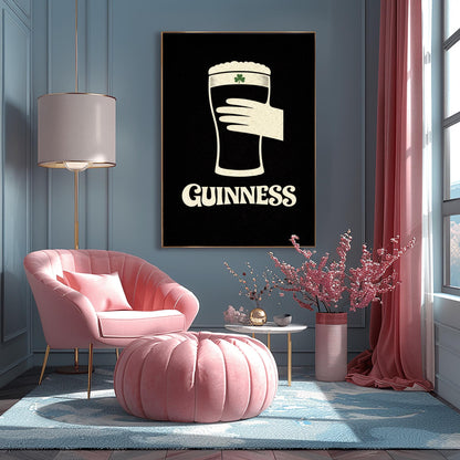 A vertical minimalist graphic design on a textured black background. A cream-colored hand is shown holding a pint of Guinness stout, with the glass itself created out of negative space. A small green shamrock is on the foam. The word "GUINNESS" is in cream text at the bottom.
